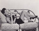 Dona Drake lounging on couch photo print, a vintage photography piece.