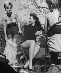 Ann Miller Sitting Photo Print showcasing the elegance of the iconic actress.