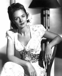 Donna Reed Sitting on Chair Photo Print - Vintage Hollywood Elegance