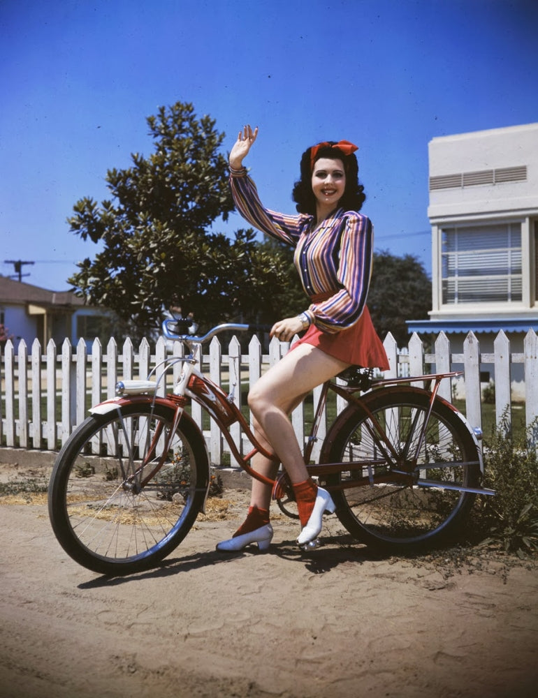 Ann Miller Bicycle Photo Print showcasing classic Hollywood elegance.