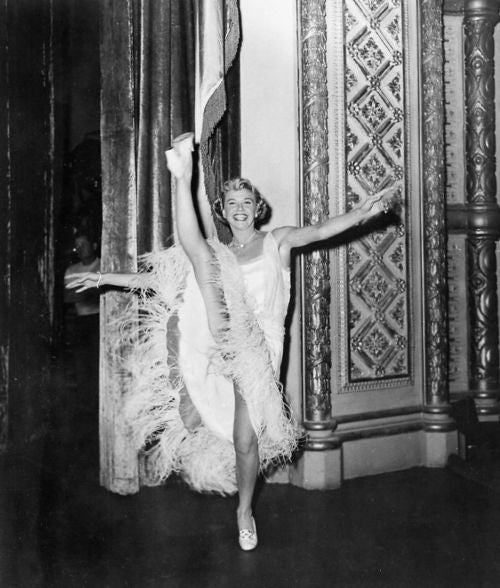 Doris Day High Kick Photo Print showcasing classic Hollywood charm.