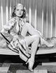 Dorothy Dell posed in robe photo print, vintage Hollywood style.