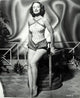 Dorothy Hart Leaning on End Table Photo Print showcasing classic Hollywood elegance.