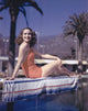 Dorothy Lamour Orange Bathing Suit Photo Print showcasing vintage Hollywood glamour.