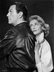 Dorothy Malone and Robert Taylor leaning on each other, vintage photo print.