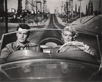 Lauren Bacall and Robert Stack driving photo print