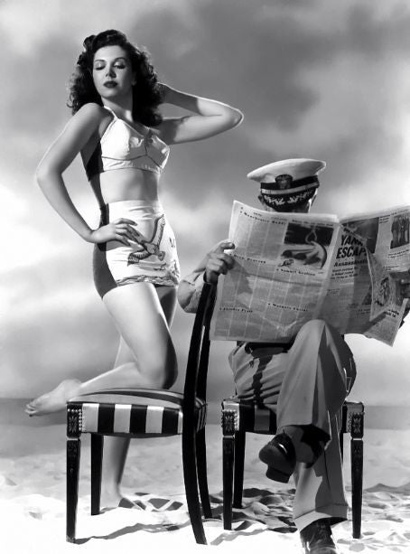 Ann Miller Newspaper Photo Print showcasing classic Hollywood charm.