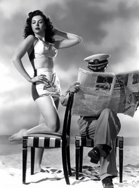 Ann Miller Newspaper Photo Print showcasing classic Hollywood charm.