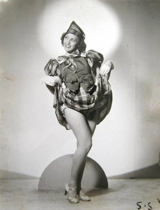 Lifting Dress Photo Print by Dorothy Mathews showcasing fashion elegance.