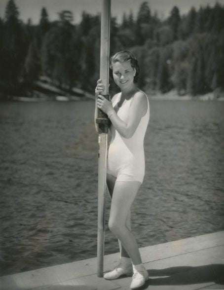 Dorothy Wilson On Dock Holding Pole Photo Print