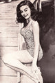 Elaine Stewart Leopard One-Piece Photo Print showcasing vintage glamour.