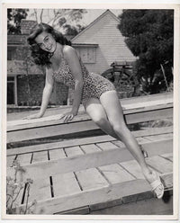 Elaine Stewart Leopard Pinup Photo Print showcasing classic retro glamour.