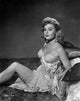 Elaine Stewart Sitting Against Pillows Photo Print