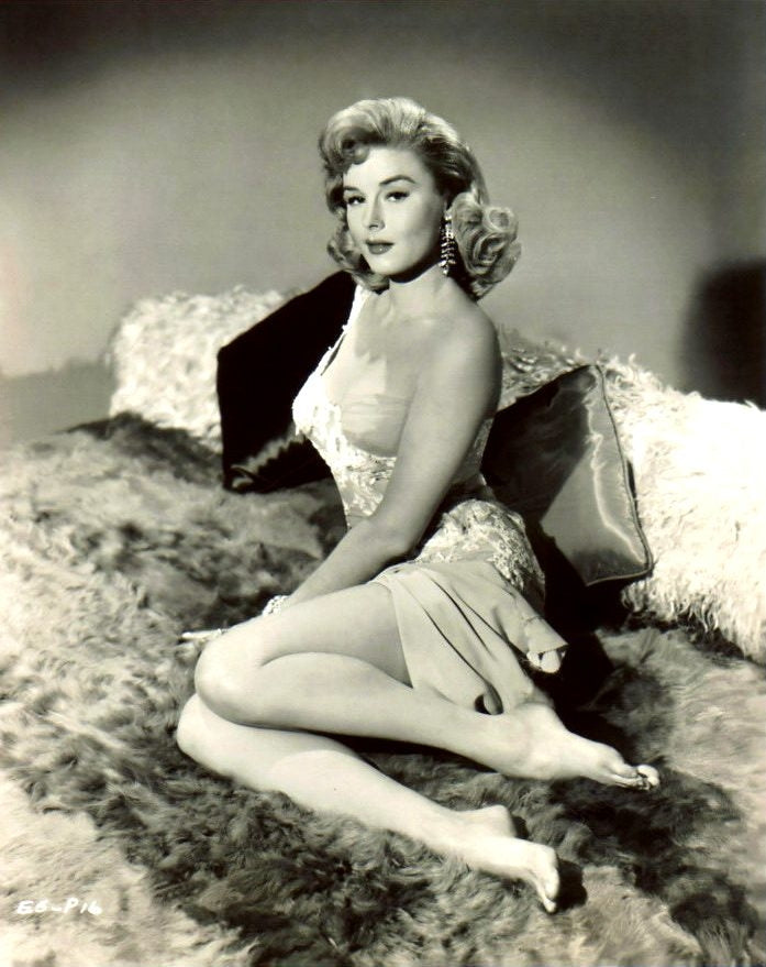 Elaine Stewart Posed on Fur Bed Photo Print showcasing classic beauty.