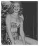 Black and white photo print of Elizabeth Montgomery in orange and blue swimsuit.