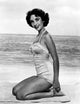 Elizabeth Taylor Kneeling on Towel Photo Print
