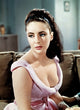Elizabeth Taylor wearing a lowcut pink top photo print