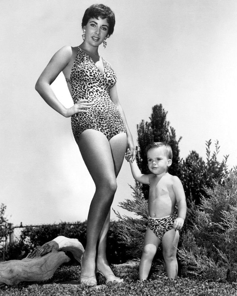 Elizabeth Taylor Holding Child's Hand Photo Print