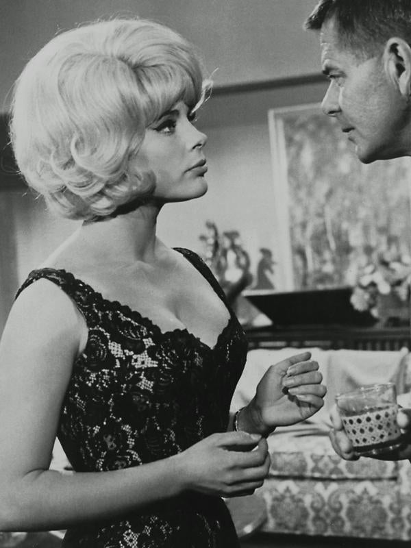 Elke Sommer Speaking with Man Photo Print
