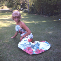 Elke Sommer Laying in Floral Dress Photo Print