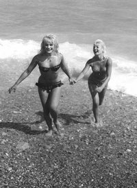 Elke Sommer Holding Hand on the Beach Photo Print