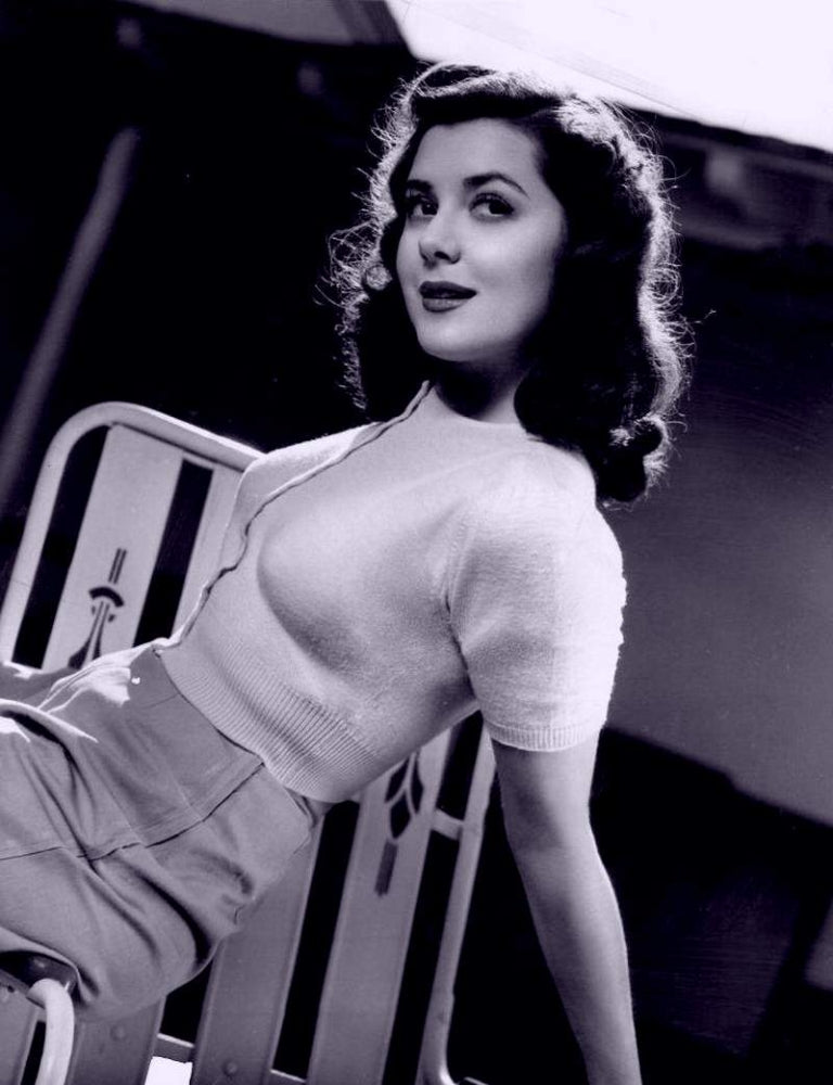 Ann Rutherford Leaning Photo Print showcasing classic Hollywood elegance.