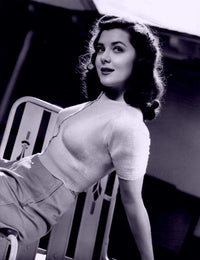 Ann Rutherford Leaning Photo Print showcasing classic Hollywood elegance.