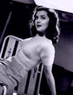 Ann Rutherford Leaning Photo Print showcasing classic Hollywood elegance.