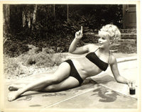 Elke Sommer laying on side in black bikini, photo print