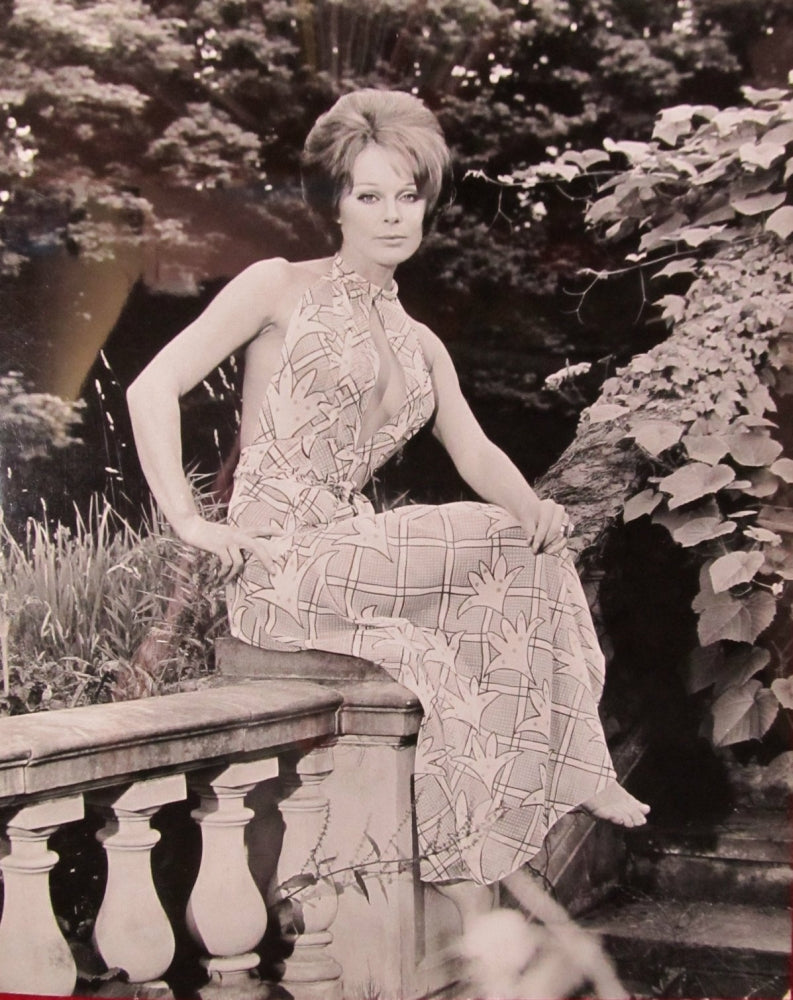 Elke Sommer Sitting on Stone Railing Photo Print