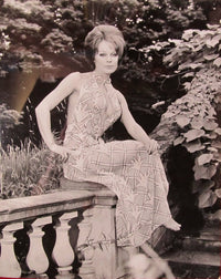 Elke Sommer Sitting on Stone Railing Photo Print