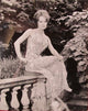 Elke Sommer Sitting on Stone Railing Photo Print