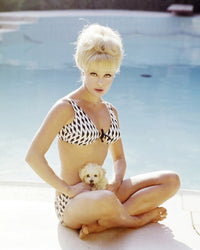Elke Sommer Sitting Criss-Cross Holding Puppy Photo Print