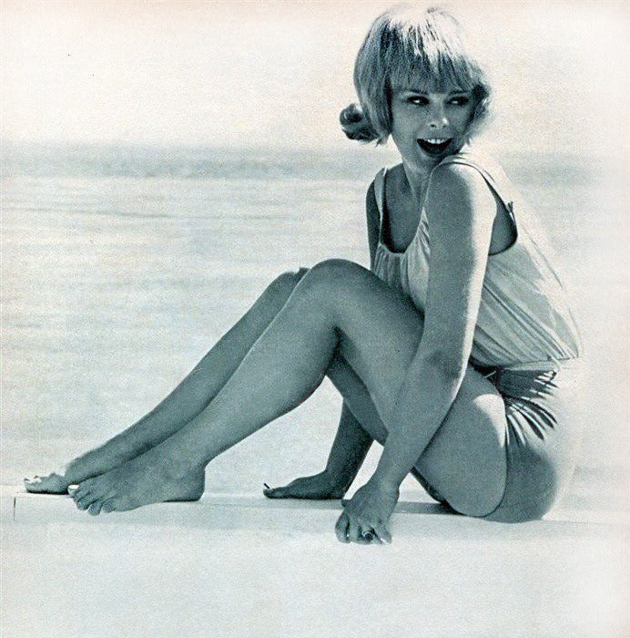 Elke Sommer Sitting Looking Back with Blue Tint Photo Print