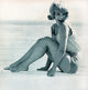 Elke Sommer Sitting Looking Back with Blue Tint Photo Print