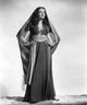 Gene Tierney Gypsy Outfit Photo Print showcasing classic Hollywood glamour.