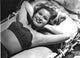 Nancy Olsen laying on cot photo print, vintage photography