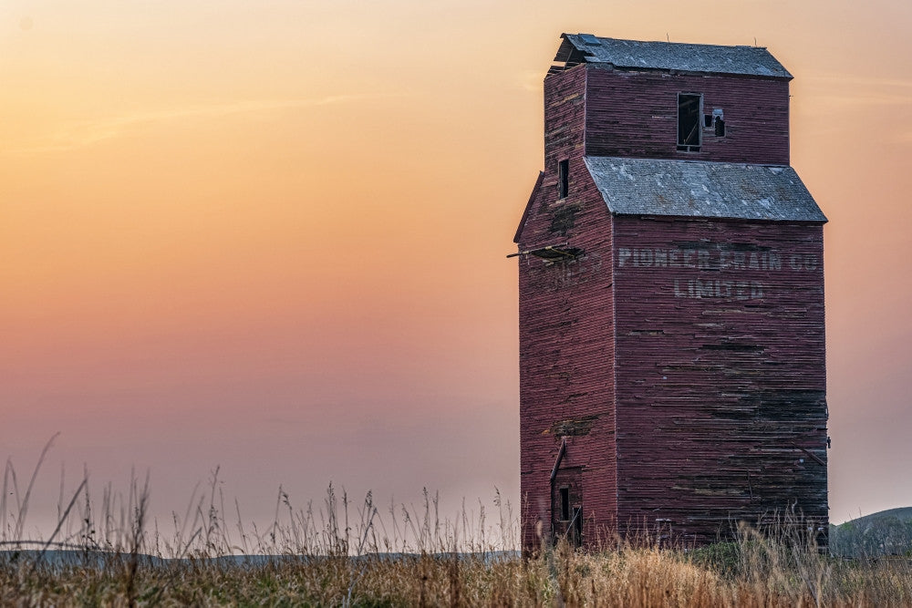 Abandoned Grain Elevator at Sunset in Saskatchewan Fine Art Print by Robert Postma