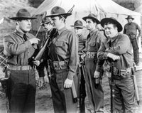 Abbott & Costello in ranger uniform holding guns photo print