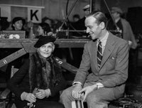 Fred Astaire seated in suit photo print, classic Hollywood elegance.