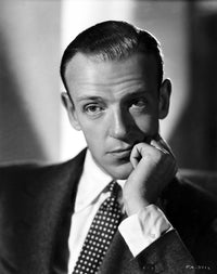 Fred Astaire leaning on hand in bored gesture photo print.