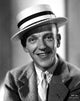 Black and white portrait photo print of Fred Astaire smiling.