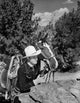 Gene Autry Hiding Behind a Big Rock Photo Print showcasing the iconic cowboy.