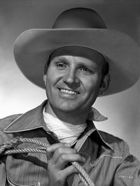 Gene Autry holding a rope photo print, capturing the essence of cowboy culture.
