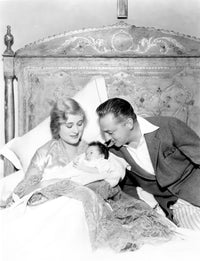 Photo print of John Barrymore and Dolores Costello with their baby