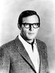 Adam West photo print featuring the iconic actor wearing glasses.