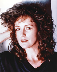 Close-up portrait photo print of Bonnie Bedelia smiling in a black shirt.