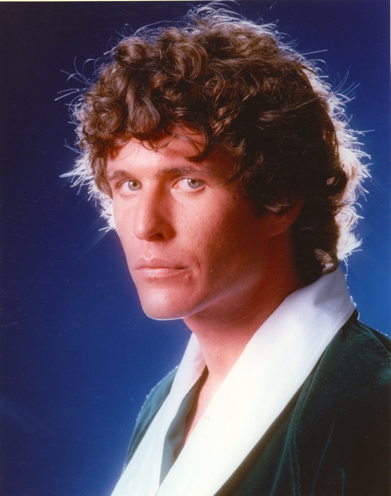 Close-up portrait photo print of Tom Berenger with white collar.
