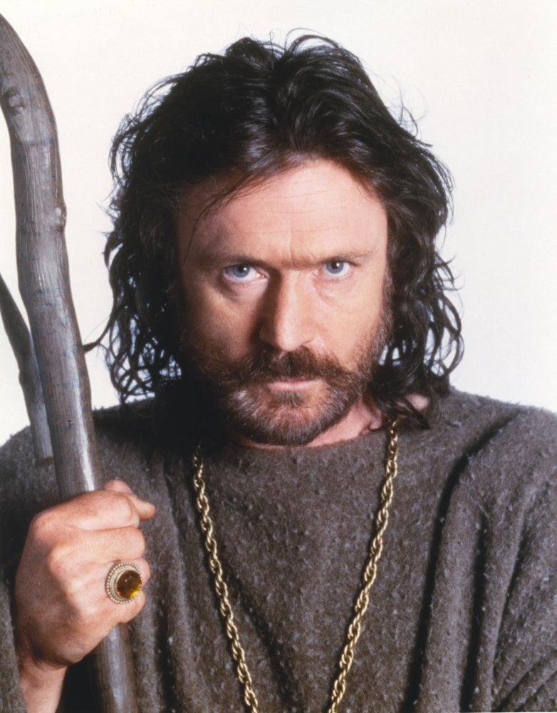 Close-up portrait photo print of Patrick Bergin against a white background.