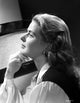 Ingrid Bergman photo print featuring her chin on fingers in a long sleeve blouse.